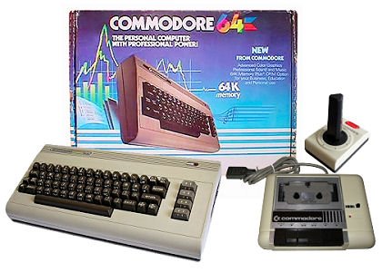 Commodore 64 dator med joystick och kartong