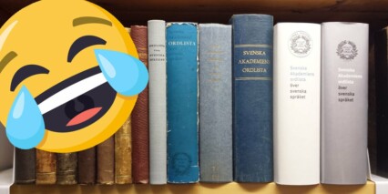 Gråtskrattande emoji bredvid Svenska akademiens ordlista.